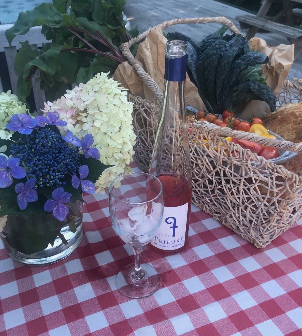 Picnic with flowers and fresh farm food